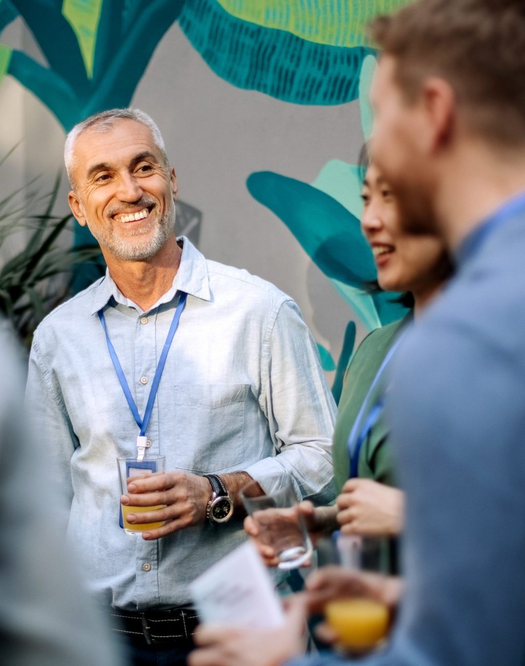 Group of business people in the conference room, having a casual conversation